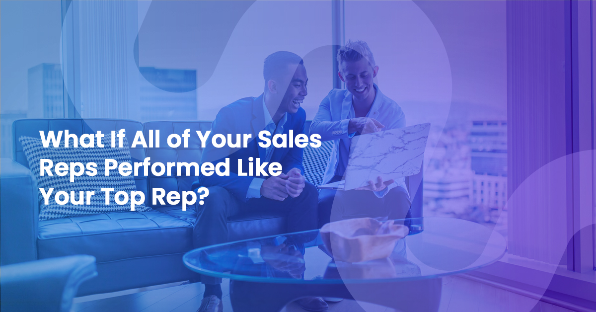 Two colleagues sharing a laptop